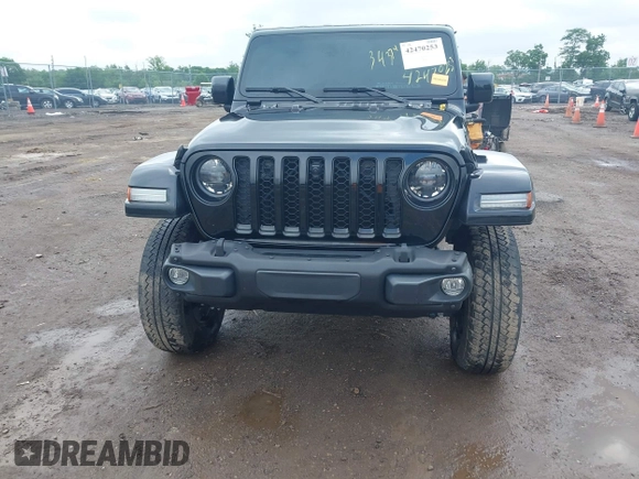 2023 Jeep Gladiator Overland with VIN 1C6JJTFM9PL593659, listed as a IAAI auction lot 42470253 with 34,374 mi miles and . Bid and sale history available at DreamBid. Image 17.