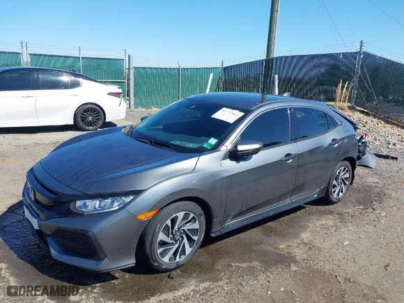 2019 Honda Civic Hatchback LX with VIN SHHFK7H31KU422745, listed as a IAAI auction lot 41772862 with 30,329 mi miles. Bid and sale history available at carsss.com. Image 2.
