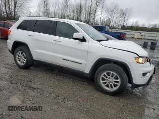 2018 Jeep Grand Cherokee Laredo E with VIN 1C4RJFAG1JC333634, listed as a Copart auction lot 51314685 with 112,613 mi miles and Salvage Title. Bid and sale history available at DreamBid. Image 4.