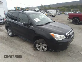 2014 Subaru Forester 2.5i Limited with VIN JF2SJAJC9EH517196, listed as a IAAI auction lot 31343919 with 71,396 mi miles. Bid and sale history available at carsss.com. Image 1.