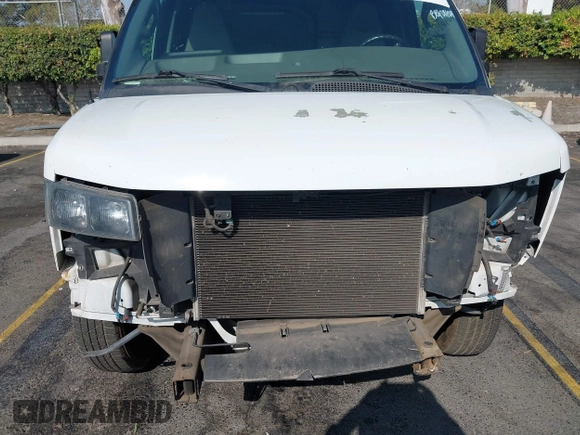 2018 Chevrolet Express Cargo with VIN 1GCWGAFP3J1343798, listed as a IAAI auction lot 40219592 with 121,288 mi miles and . Bid and sale history available at DreamBid. Image 6.
