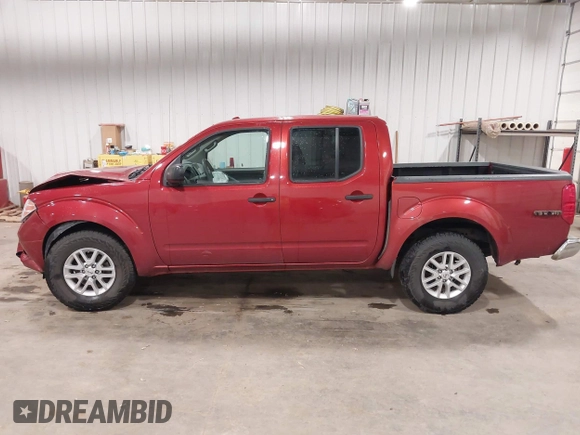 2014 Nissan Frontier S with VIN 1N6AD0EV6EN708600, listed as a IAAI auction lot 42296112 with 112,737 mi miles and . Bid and sale history available at DreamBid. Image 15.