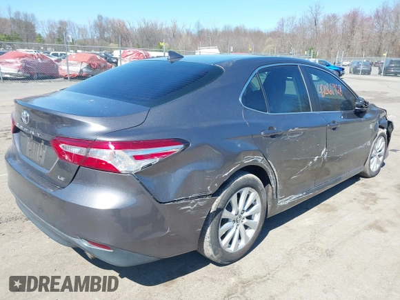 2019 Toyota Camry LE z VIN 4T1B11HK9KU245615, wystawiony jako IAAI lot #42066968 z przebiegiem 130 042 mil mil oraz . Historia ofert i sprzedaży dostępna na DreamBid. Obrazek 4.