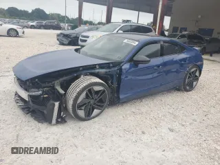 2023 Audi RS e-tron GT z VIN WAUBHBFW1P7903684, wystawiony jako Copart lot #76603094 z przebiegiem 6071 mil mil oraz Nie do naprawy. Historia ofert i sprzedaży dostępna na DreamBid. Obrazek 1.
