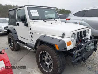 2006 Jeep Wrangler X with VIN 1J4FA39S16P703436, listed as a IAAI auction lot 41341557 with 65,639 mi miles. Bid and sale history available at carsss.com. Image 1.