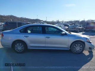 2014 Volkswagen Passat S w/Nav with VIN 1VWAP7A35EC052552, listed as a IAAI auction lot 41377109 with 123,273 mi miles. Bid and sale history available at carsss.com. Image 13.
