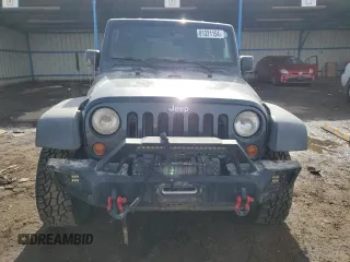 2007 Jeep Wrangler Unlimited Rubicon with VIN 1J4GA69177L100903, listed as a Copart auction lot 81321154 with 130,632 mi miles and Salvage title. Bid and sale history available at DreamBid. Image 5.