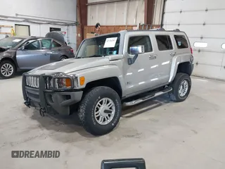 2006 Hummer H3 with VIN 5GTDN136268123052, listed as a IAAI auction lot 42126283 with 124,040 mi miles. Bid and sale history available at carsss.com. Image 2.