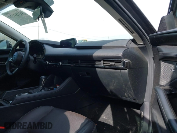 2023 Mazda 3 S Premium with VIN 3MZBPBDM8PM373434, listed as a IAAI auction lot 41234729 with 9,387 mi miles and . Bid and sale history available at DreamBid. Image 5.