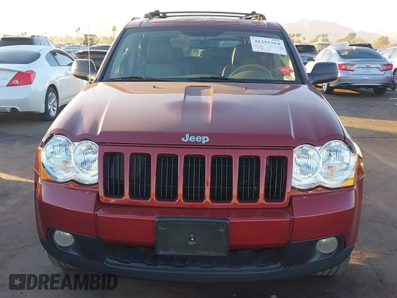 2008 Jeep Grand Cherokee Laredo with VIN 1J8GR48K08C233266, listed as a IAAI auction lot 41291164 with 159,208 mi miles. Bid and sale history available at carsss.com. Image 12.