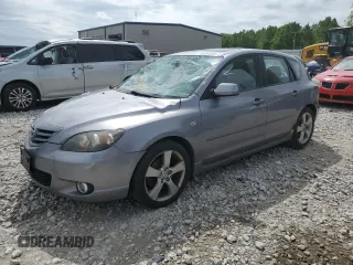 2005 Mazda 3 s z VIN JM1BK143351290751, wystawiony jako Copart lot #58084005 z przebiegiem 124 814 mil mil oraz Czysty tytuł • Clean title. Historia ofert i sprzedaży dostępna na DreamBid. Obrazek 1.