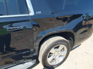 2015 Chevrolet Suburban LTZ with VIN 1GNSKKKC7FR205638, listed as a IAAI auction lot 40284367 with 103,530 mi miles and . Bid and sale history available at DreamBid. Image 6.