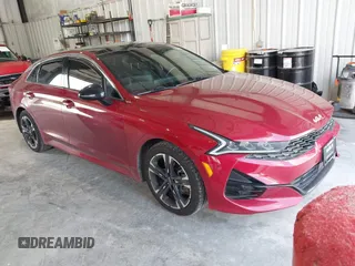 2022 Kia K5 GT-Line z VIN 5XXG64J22NG151027, wystawiony jako IAAI lot #42239751 z przebiegiem 86 626 mil mil oraz . Historia ofert i sprzedaży dostępna na DreamBid. Obrazek 1.