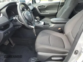 2024 Toyota RAV4 Hybrid LE with VIN 2T3LWRFV3RW224830, listed as a Copart auction lot 64658805 with 10,671 mi miles and Clean title. Bid and sale history available at DreamBid. Image 7.