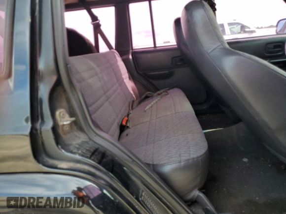 2000 Jeep Cherokee with VIN 1J4FT48S3YL139915, listed as a Copart auction lot 69840924 with 249,720 mi miles and Salvage title. Bid and sale history available at DreamBid. Image 11.