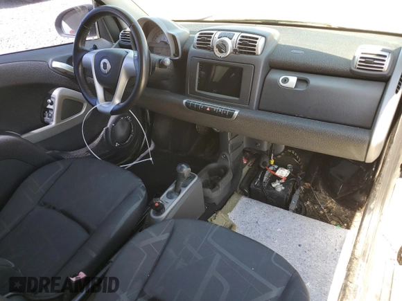 2009 Smart fortwo Pure with VIN WMEEJ31X49K224990, listed as a Copart auction lot 52111335 with 72,317 mi miles and Salvage Title. Bid and sale history available at carsss.com. Image 8.