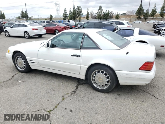 1997 Mercedes-Benz SL 500 with VIN WDBFA63F5VF143197, listed as a Copart auction lot 45003735 with 100,252 mi miles and Salvage title. Bid and sale history available at DreamBid. Image 2.