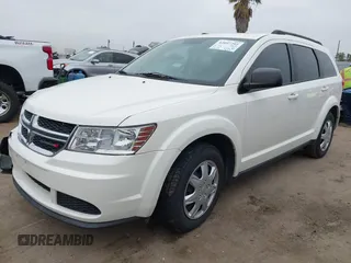 2014 Dodge Journey American Value with VIN 3C4PDCAB8ET141803, listed as a IAAI auction lot 42097292 with 76,339 mi miles and . Bid and sale history available at DreamBid. Image 17.