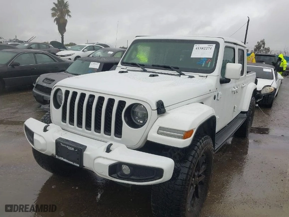 2021 Jeep Gladiator Overland with VIN 1C6HJTFG8ML567025, listed as a IAAI auction lot 41582271 with 53,621 mi miles. Bid and sale history available at carsss.com. Image 2.