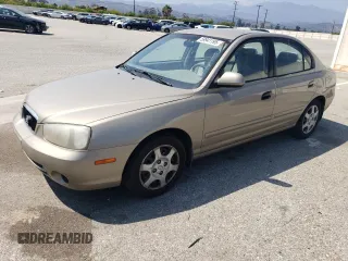 2003 Hyundai Elantra GLS z VIN KMHDN45D03U490373, wystawiony jako Copart lot #59941195 z przebiegiem 201 963 mil mil oraz Szkoda całkowita • Salvage title. Historia ofert i sprzedaży dostępna na DreamBid. Obrazek 1.