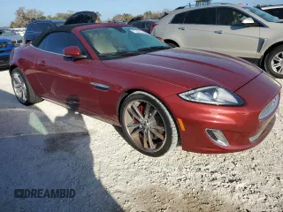 2013 Jaguar XK with VIN SAJWA4GB9DLB51059, listed as a Copart auction lot 77322014 with 0 mi miles and Salvage Title. Bid and sale history available at carsss.com. Image 4.