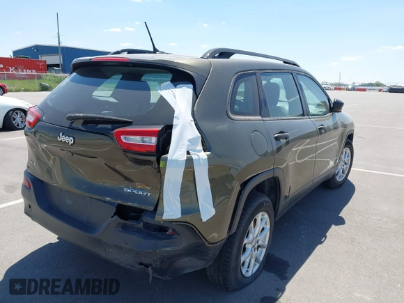 2015 Jeep Cherokee Sport with VIN 1C4PJMAB9FW595102, listed as a IAAI auction lot 42257918 with 95,059 mi miles and . Bid and sale history available at DreamBid. Image 4.