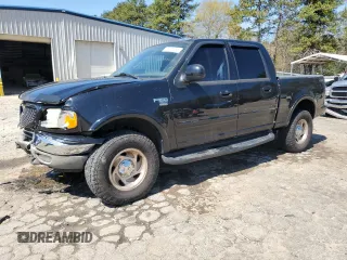 2003 Ford F-150 XLT with VIN 1FTRW08L63KB47470, listed as a Copart auction lot 50400055 with 223,859 mi miles and Salvage Title. Bid and sale history available at carsss.com. Image 1.
