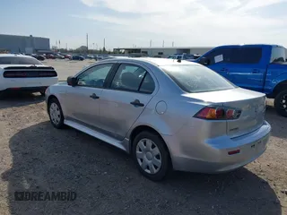 2010 Mitsubishi Lancer DE with VIN JA32U1FU4AU015574, listed as a IAAI auction lot 41770332 with 125,458 mi miles. Bid and sale history available at carsss.com. Image 3.