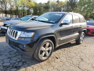 2012 Jeep Grand Cherokee Overland with VIN 1C4RJFCG4CC292383, listed as a Copart auction lot 51168385 with 132,697 mi miles and Salvage Title. Bid and sale history available at carsss.com. Image 1.
