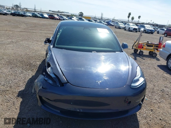 2020 Tesla Model 3 Standard Range Plus with VIN 5YJ3E1EA5LF644282, listed as a IAAI auction lot 41710124 with 69,969 mi miles and . Bid and sale history available at DreamBid. Image 11.