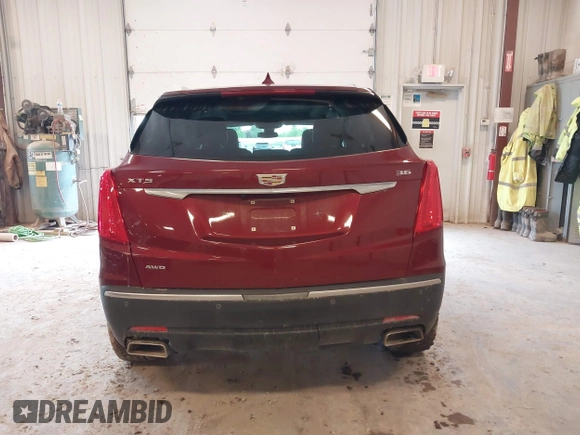 2018 Cadillac XT5 Premium Luxury AWD z VIN 1GYKNFRS6JZ114464, wystawiony jako IAAI lot #42320302 z przebiegiem 61 231 mil mil oraz . Historia ofert i sprzedaży dostępna na DreamBid. Obrazek 17.