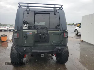 2012 Jeep Wrangler Unlimited Sport with VIN 1C4HJWDG8CL122067, listed as a Copart auction lot 58549805 with 124,658 mi miles and Clean title. Bid and sale history available at DreamBid. Image 6.