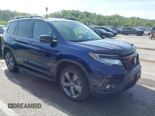 2020 Honda Passport Touring z VIN 5FNYF8H94LB015299, wystawiony jako IAAI lot #42064416 z przebiegiem 62 397 mil mil oraz . Historia ofert i sprzedaży dostępna na DreamBid. Obrazek 1.
