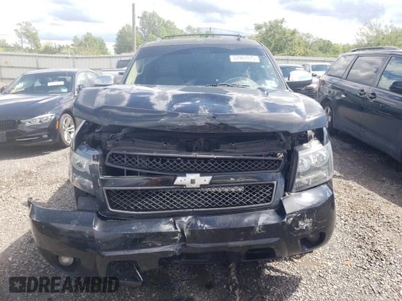 2009 Chevrolet Tahoe LTZ with VIN 1GNFK33039J125428, listed as a Copart auction lot 57962875 with 245,554 mi miles and Salvage title. Bid and sale history available at DreamBid. Image 5.
