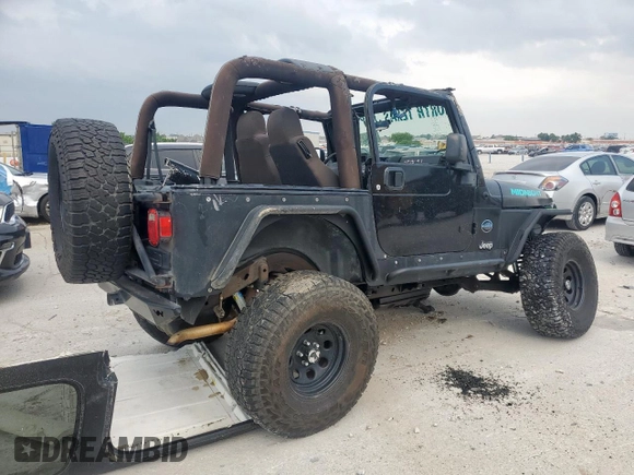 2005 Jeep Wrangler X with VIN 1J4FA39S25P367360, listed as a Copart auction lot 57504365 with 112,125 mi miles and Salvage title. Bid and sale history available at DreamBid. Image 3.