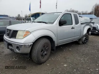 2005 Nissan Frontier LE with VIN 1N6AD06W35C434095, listed as a Copart auction lot 82559744 with 136,085 mi miles and Salvage title. Bid and sale history available at DreamBid. Image 1.