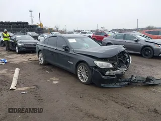 2015 BMW 7 Series 750i xDrive with VIN WBAYB6C59FD965820, listed as a IAAI auction lot 41558215 with 142,617 mi miles. Bid and sale history available at carsss.com. Image 1.
