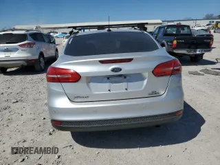 2016 Ford Focus SE with VIN 1FADP3F24GL267194, listed as a Copart auction lot 48812385 with 154,466 mi miles and Salvage Title. Bid and sale history available at carsss.com. Image 6.