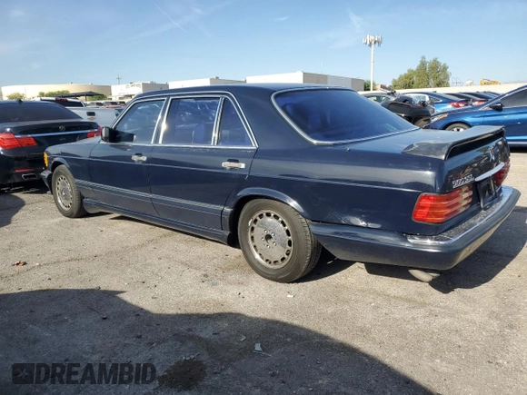 1990 Mercedes-Benz 560 with VIN WDBCA39EXLA503543, listed as a Copart auction lot 65978444 with 195,635 mi miles and Clean Title. Bid and sale history available at DreamBid. Image 2.