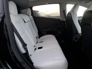 2025 Tesla Model Y Long Range z VIN 7SAYGDED9SF313959, wystawiony jako Copart lot #52823755 z przebiegiem 1 137 mil mil oraz Szkoda całkowita • Salvage title. Historia ofert i sprzedaży dostępna na DreamBid. Obrazek 11.