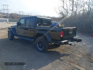2021 Jeep Gladiator Overland z VIN 1C6HJTFG1ML606215, wystawiony jako IAAI lot #41771646 z przebiegiem 77 411 mil mil oraz . Historia ofert i sprzedaży dostępna na DreamBid. Obrazek 3.