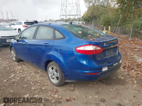 2018 Ford Fiesta SE with VIN 3FADP4BJ4JM132094, listed as a IAAI auction lot 40393706 with 142,494 mi miles. Bid and sale history available at carsss.com. Image 3.