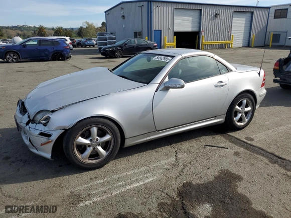 2002 Mercedes-Benz SLK-Class 3.2L with VIN WDBKK65F22F253077, listed as a Copart auction lot 50562985 with 152,195 mi miles and Salvage Title. Bid and sale history available at carsss.com. Image 1.