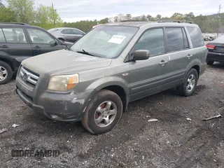 2008 Honda Pilot EX-L with VIN 5FNYF18558B010267, listed as a IAAI auction lot 41714789 with 264,576 mi miles. Bid and sale history available at carsss.com. Image 2.