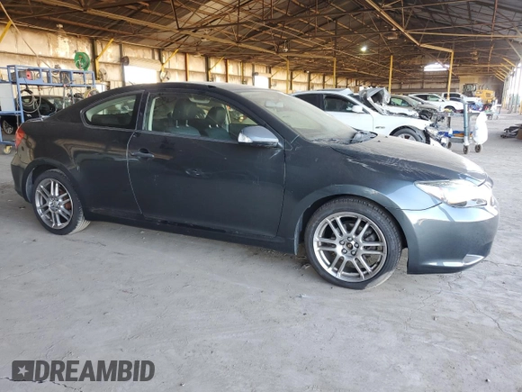 2005 Scion tC with VIN JTKDE177950027533, listed as a Copart auction lot 77613954 with 179,691 mi miles and Salvage Title. Bid and sale history available at carsss.com. Image 4.