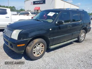2003 Mercury Mountaineer Convenience z VIN 4M2DU86K43ZJ10878, wystawiony jako IAAI lot #42390874 z przebiegiem 194 867 mil mil oraz . Historia ofert i sprzedaży dostępna na DreamBid. Obrazek 2.