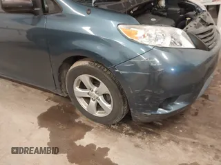 2014 Toyota Sienna L with VIN 5TDZK3DCXES434910, listed as a IAAI auction lot 41731864 with 146,161 mi miles. Bid and sale history available at carsss.com. Image 6.
