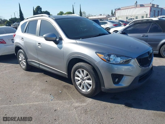 2013 Mazda CX-5 Touring with VIN JM3KE2CE3D0123138, listed as a IAAI auction lot 41818678 with 173,909 mi miles. Bid and sale history available at carsss.com. Image 1.
