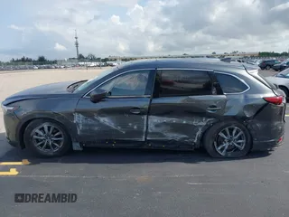2021 Mazda CX-9 Touring с VIN JM3TCACY4M0511512, выставлен на аукционе IAAI как лот 42376544 с пробегом 50 485 миль миль и . История ставок и продаж доступна на DreamBid. Изображение 14.