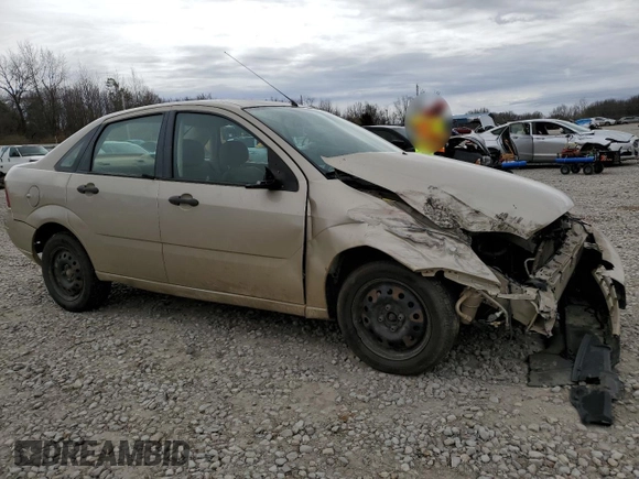 2007 Ford Focus S with VIN 1FAFP34N07W242359, listed as a Copart auction lot 61677025 with 164,445 mi miles and Salvage title. Bid and sale history available at DreamBid. Image 4.